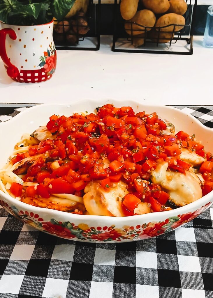 Bruschetta chicken over linguine pasta