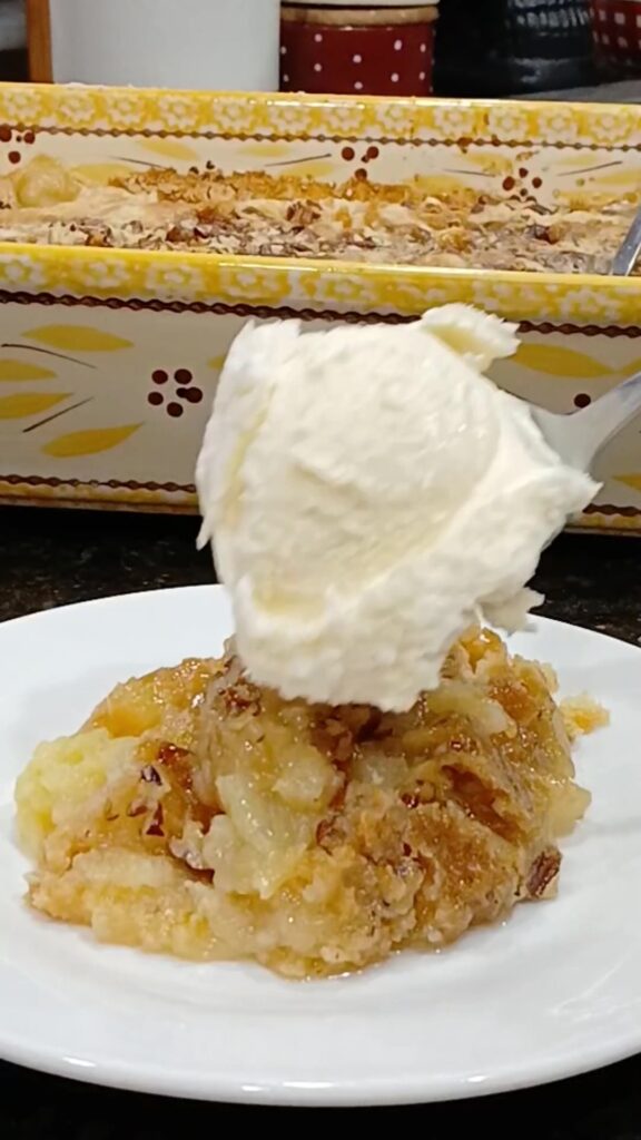 Pineapple Cobbler Dump Cake on a white plate